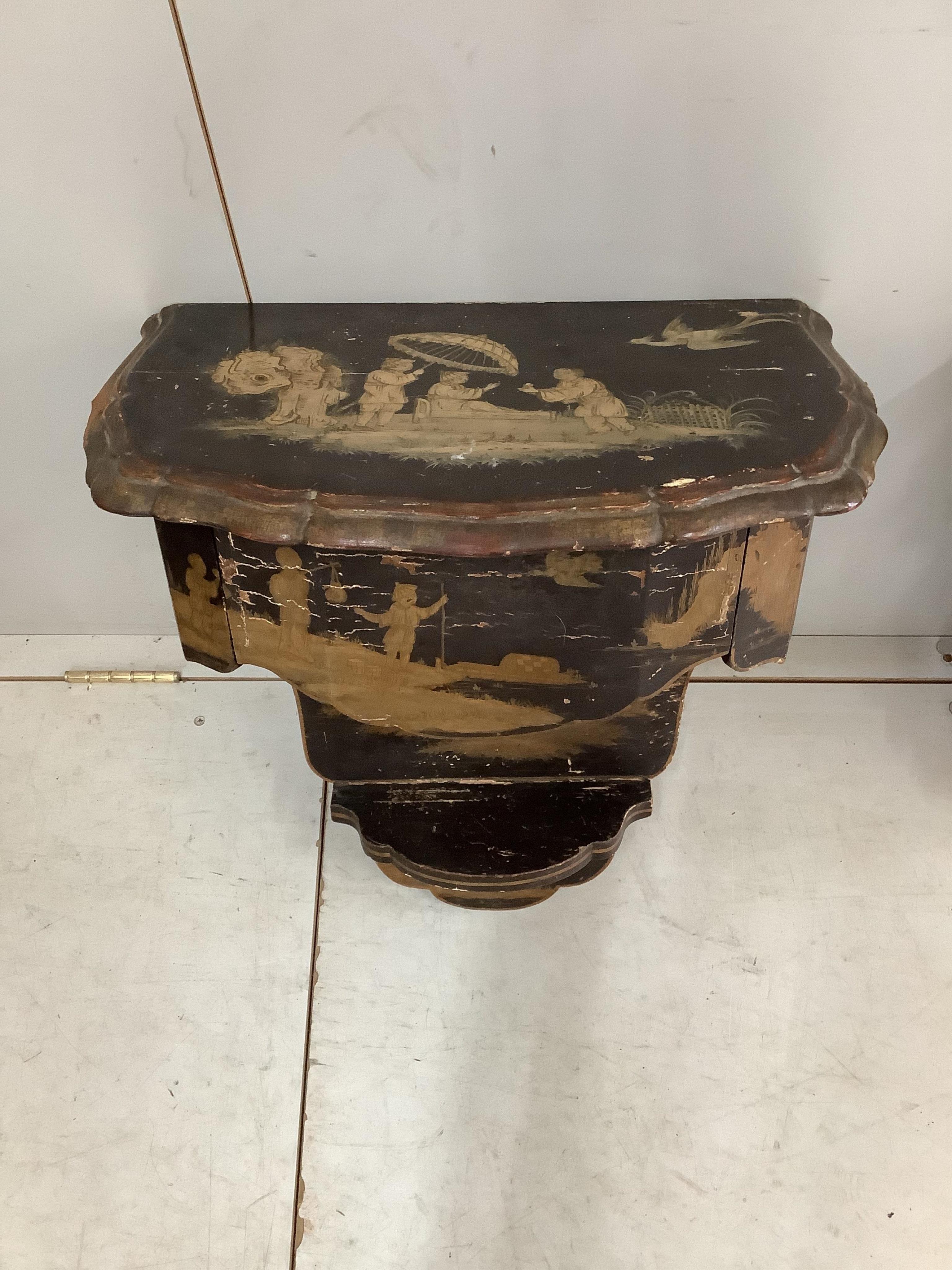 A pair of chinoiserie lacquer wall brackets each fitted single drawer, width 44cm, depth 29cm, height 56cm